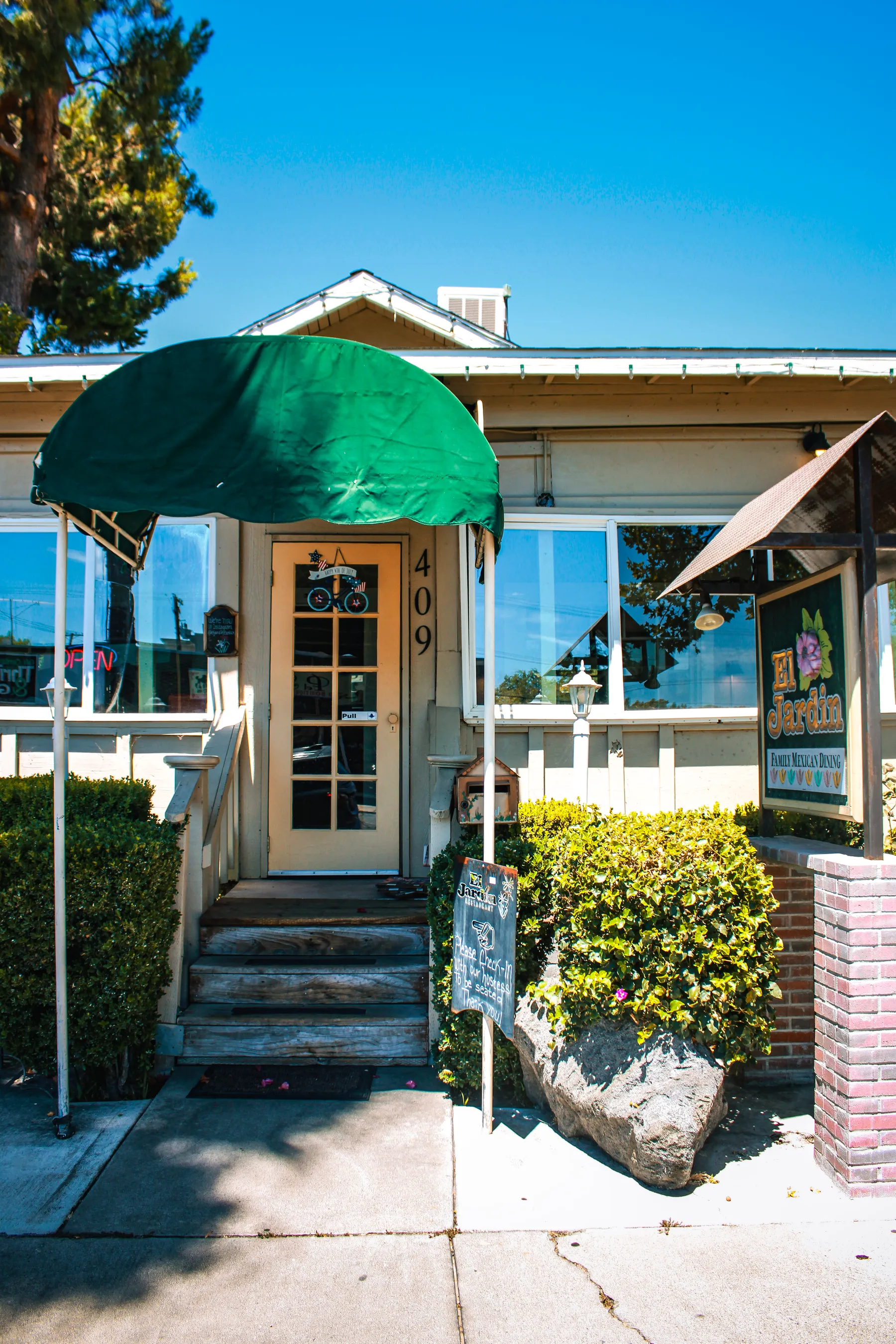 El Jardín's converted-house storefront on E Olive Ave